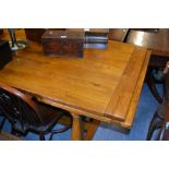 20th Century light oak refectory style draw-leaf dining table on baluster turned supports with H