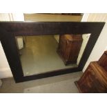 Late 20th Century black framed rectangular wall mirror,