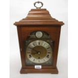 Reproduction mahogany three train bracket clock retailed by Garrard and Co.