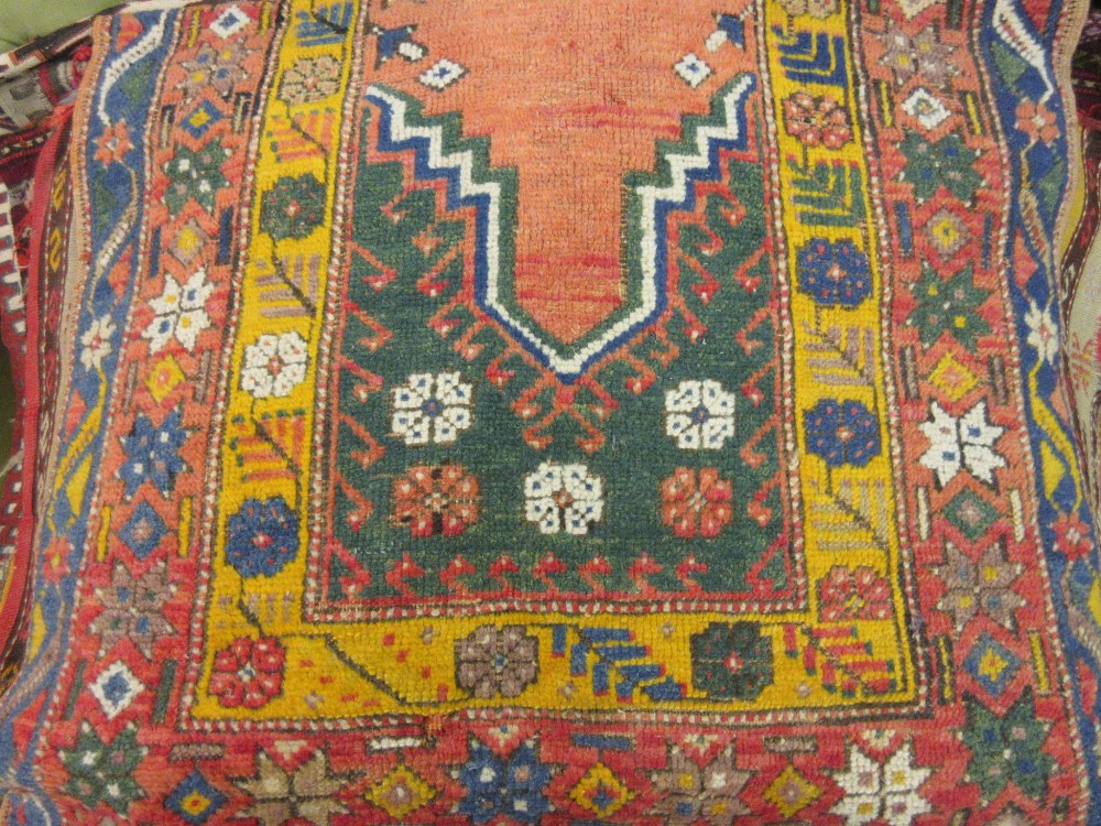 Small Turkish prayer rug with a rose ground,