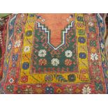 Small Turkish prayer rug with a rose ground,