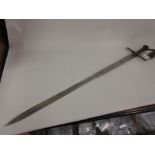 Sudanese steel bladed sword with leather grip,