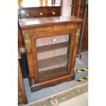 Victorian figured walnut single door pier cabinet,