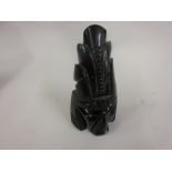 Oriental carved black hardstone bust of a figure wearing an ornate headdress, 5.