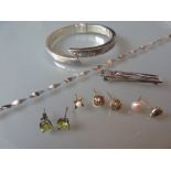 Silver bangle, silver bracelet and brooch,