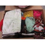 Two boxes containing a quantity of various handbags, scarves,