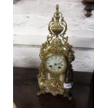 19th Century French ormolu mantel clock having circular dial with Roman numerals,