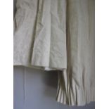 Pair of large white damask curtains with linings and a brass curtain pole with ball finials and