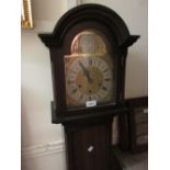 Reproduction mahogany grandmother clock having brass dial with three train Westminster chime