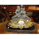 19th Century French dark patinated and gilded spelter mantel clock,