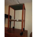 Mid 20th Century black and orange taped two tier tea trolley with chromed and glass fitted trays