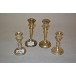 Pair of small modern Birmingham silver baluster form candlesticks,