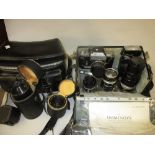Nikon F camera outfit including four Nikkor lenses and other accessories,