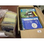 Two boxes containing a quantity of 1960's - 1990's Milwall football programmes