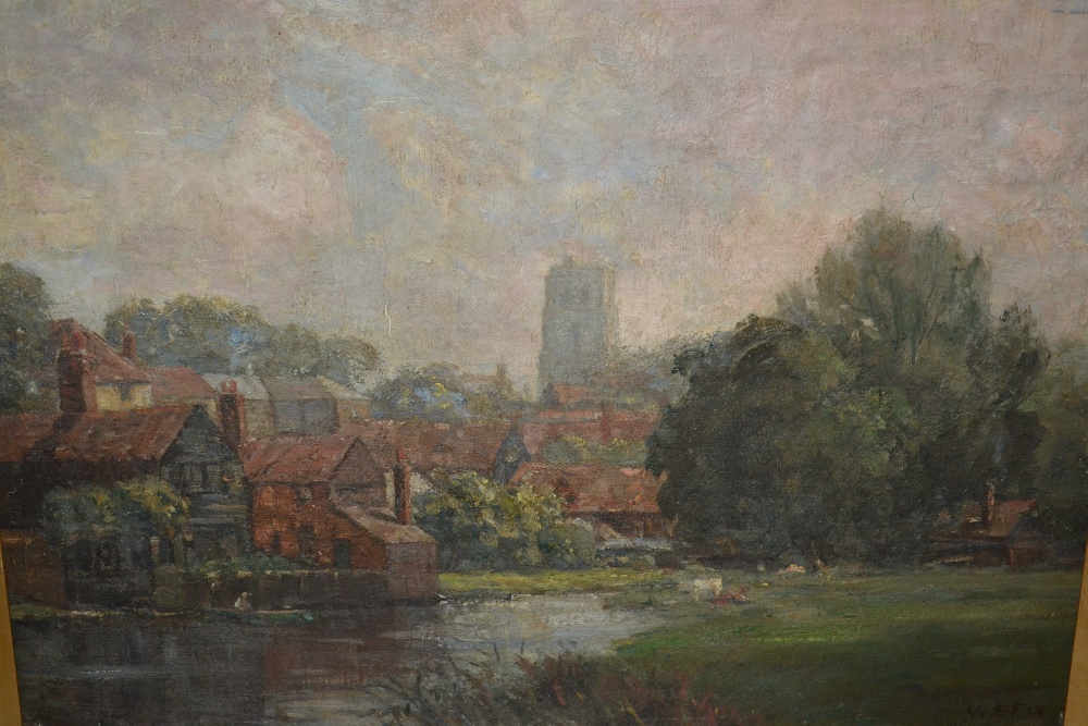 W.E. Fox, signed oil on canvas, riverside town with boatman and cattle at the water's edge, 15.