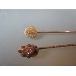 Two gold stick pins,