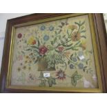 Oak framed embroidery, vase of flowers with insects,