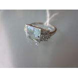 18ct White gold square aquamarine and diamond ring