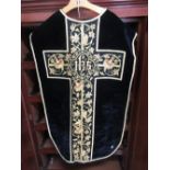 Priests cassock in black velvet with floral embroidered cross and gold trim