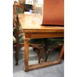 Rectangular mahogany farmhouse style draw-leaf kitchen table raised on turned supports