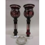 Pair of red overlaid clear glass vases together with a faceted glass paperweight (a/f)