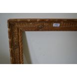 Two antique carved softwood picture frames