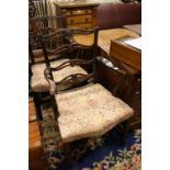 Pair of 19th Century pierced rail back mahogany open elbow chairs on square moulded front supports