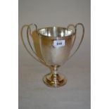 Plain silver pedestal two handled trophy cup,