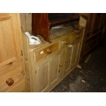 19th Century stripped pine dresser with a boarded shelf back above two drawers with two cupboard
