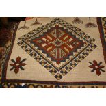 Modern Turkish rug with twin medallion design on an ivory ground with borders,