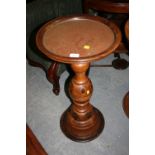 Late 19th or early 20th Century South American olive wood and rosewood circular pedestal table,