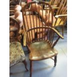 19th Century yew and elm Windsor chair on turned supports with crinoline stretcher (repairs)
