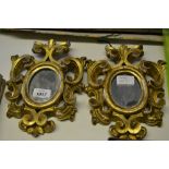 Pair of 19th Century Florentine design oval carved giltwood frames