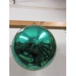 Large green glass witch ball