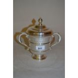 Silver two handled trophy cup and cover of baluster form with scroll handles,