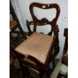 Set of three Victorian mahogany balloon back dining chairs with drop-in seats raised on turned