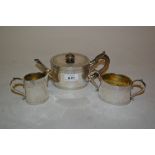 Victorian silver oval bachelor's teapot with bands of engraved decoration on a plain ground