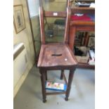 Victorian mahogany bar stool with back support on turned supports