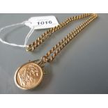 Gold sovereign 1980 in a 9ct gold pendant mount with 9ct gold rope link chain