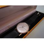 Gentleman's Favre-Leuba 18ct gold cased wristwatch with black leather strap in original box