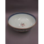 18th Century Chinese famille rose bowl decorated with panels of figures and flowers within blue