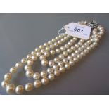 Good quality triple row uniform cultured pearl necklace,
