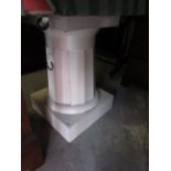 White painted pedestal column