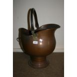 19th Century copper helmet shaped coal scuttle with swing handle