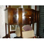 Small mahogany serpentine shaped sideboard in George III style with two centre drawers flanked by a