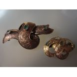 19th Century gold bow form brooch set green tourmalines and a similar smaller brooch