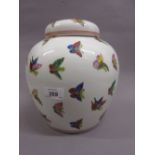 20th Century Chinese porcelain ginger jar with cover painted with butterflies,