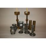 Pewter goblet, pair of pewter candlesticks, three pewter mugs,