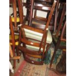 Set of five Regency mahogany and black line inlaid dining chairs on turned tapering front supports