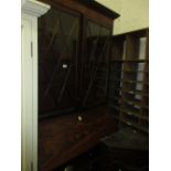 George III mahogany bureau bookcase, the moulded cornice above a pair of astragal glazed doors,